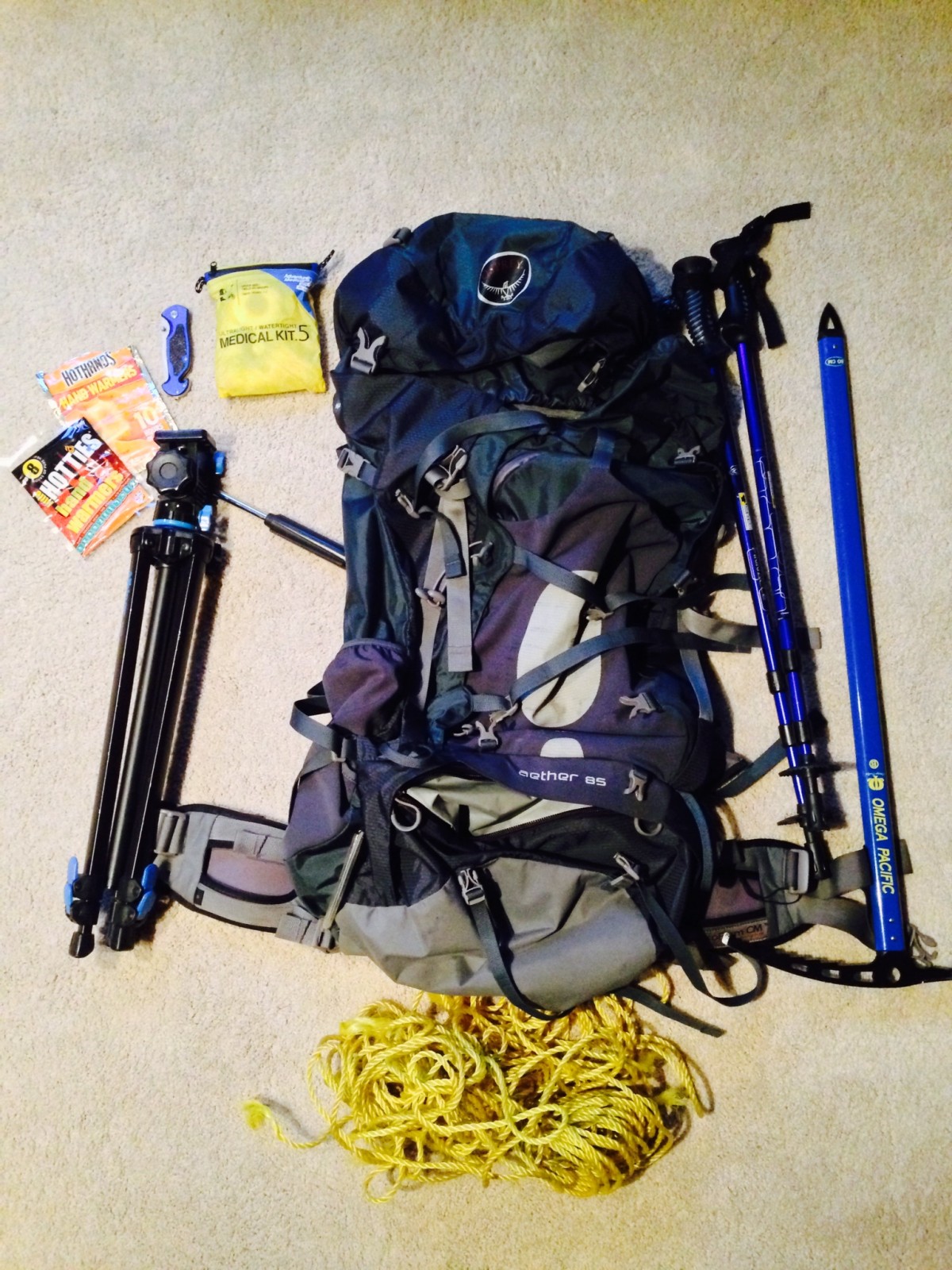 Osprey Aether 85L backpack, camera tri-pod, Omega Pacific 80cm ice axe, Mountainsmith trekking poles, paracord, med-kit, knife, hand warmers